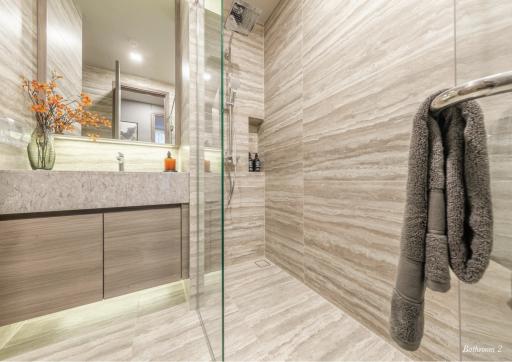 Modern bathroom interior with glass shower and elegant design