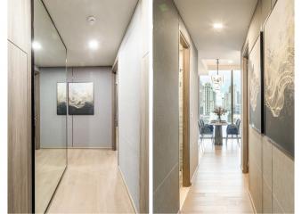 Modern hallway interior leading to a spacious dining area with city views