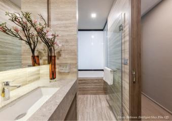 Modern bathroom with intelligent glass film technology and elegant finishes