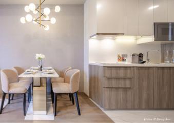 Modern kitchen with dining table set for four people