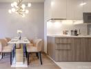 Modern kitchen with dining table set for four people