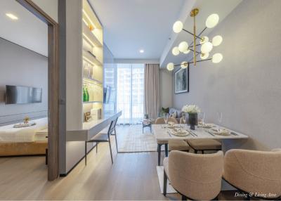 Spacious combined living and dining area with modern furnishings and abundant natural light