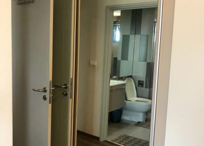 Interior bathroom view through an open door
