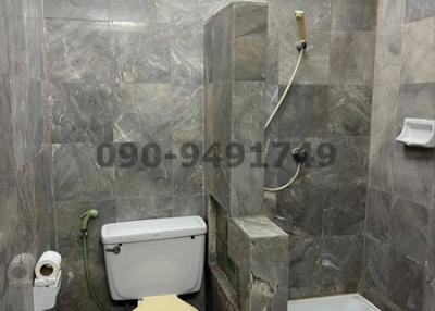 Modern bathroom interior with marble tiles and shower