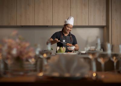 Chef preparing food in a modern home kitchen