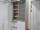 Built-in white storage cabinet in a home