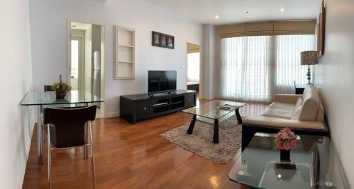 Spacious living room with modern furniture and natural light