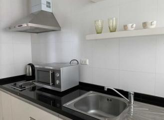 Modern kitchen with stainless steel appliances