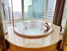 Spacious bathroom with a large jacuzzi tub and city view