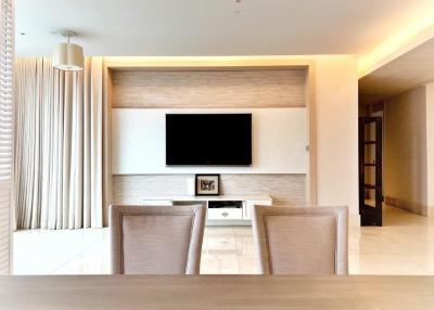 Modern living room interior with television and dining area