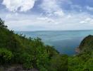 panoramic view of coastal landscape with lush greenery