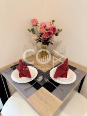 Elegantly set table for two in a modern dining area