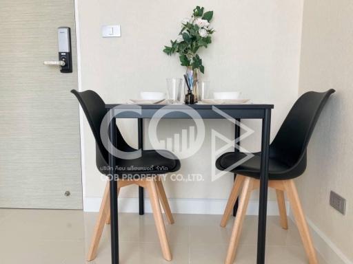 Modern dining area with table set for two
