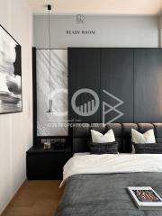 Modern bedroom with a large bed and elegant decor