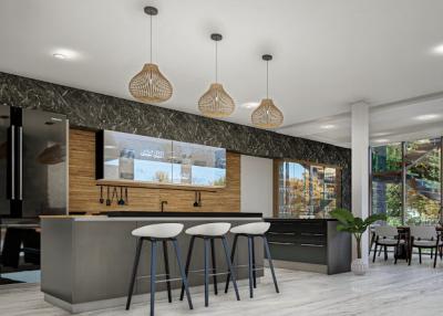 Modern kitchen with open plan design, bar stools and pendant lighting