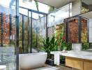 Spacious modern bathroom with natural light and greenery