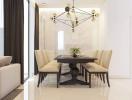 Modern dining room with chandelier and elegant furniture