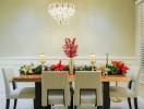 Elegant dining room with a festive centerpiece and modern chandelier