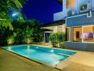 Elegant house exterior with swimming pool at twilight