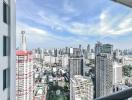 Panoramic city view from a high-rise apartment balcony