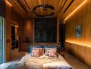 Modern bedroom with elegant wood finishes and atmospheric lighting