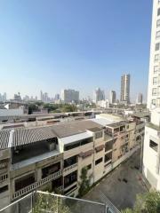 Cityscape view from a high vantage point showing buildings and skyline