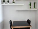 Modern dining area with wooden table and minimalist decor