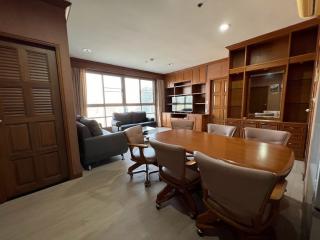 Spacious living room with dining area and modern furniture