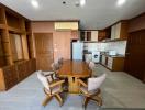 Spacious kitchen with modern appliances and large dining table