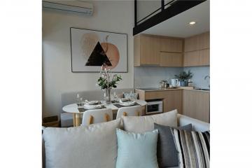 "Luxury Phra Khanong Condo: 2BR, City Views, Amenities"