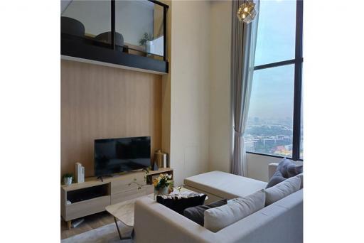 "Luxury Phra Khanong Condo: 2BR, City Views, Amenities"