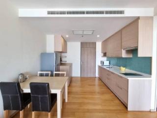 Modern kitchen with adjacent dining area in an apartment