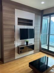 Modern Living Room with Wooden Floors and Built-In Entertainment Unit