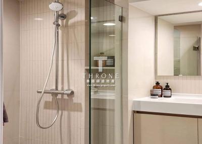 Modern bathroom with glass shower and vanity