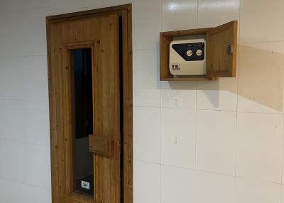 Wooden door entryway with intercom system