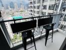 High-rise apartment balcony with city view