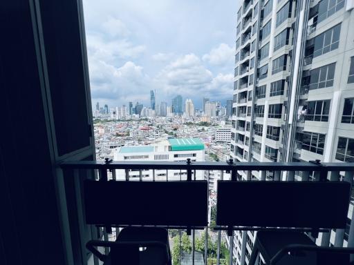 High-rise balcony with a view of the city skyline