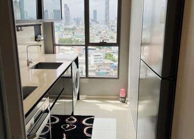 High-rise apartment interior with city view