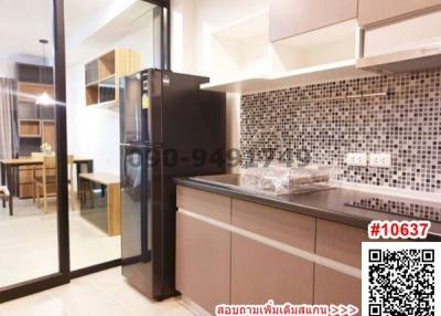 Modern kitchen with mosaic tile backsplash and wooden cabinets