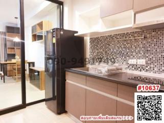 Modern kitchen with mosaic tile backsplash and wooden cabinets