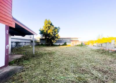 Spacious backyard of a residential property at twilight