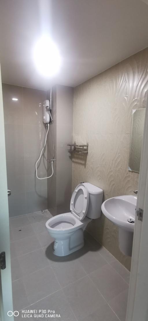 Modern bathroom with toilet and bidet