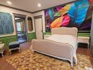 Colorful modern bedroom with artistic wall mural and elegant furniture