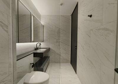 Modern bathroom with marble finishes and sleek design