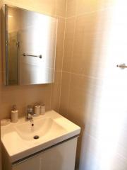 Bright bathroom with sink and mirror