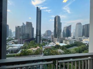 City view from high-rise apartment balcony at dusk