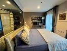 Cozy modern bedroom with glass partition and well-appointed furnishings