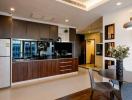 Modern kitchen with open layout and stainless steel appliances