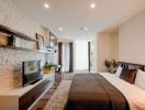 Modern bedroom with stone accent wall and expansive window