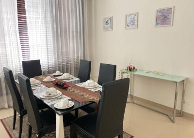 Well-appointed dining room with a large table and comfortable chairs